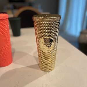 Gold Starbucks tumbler